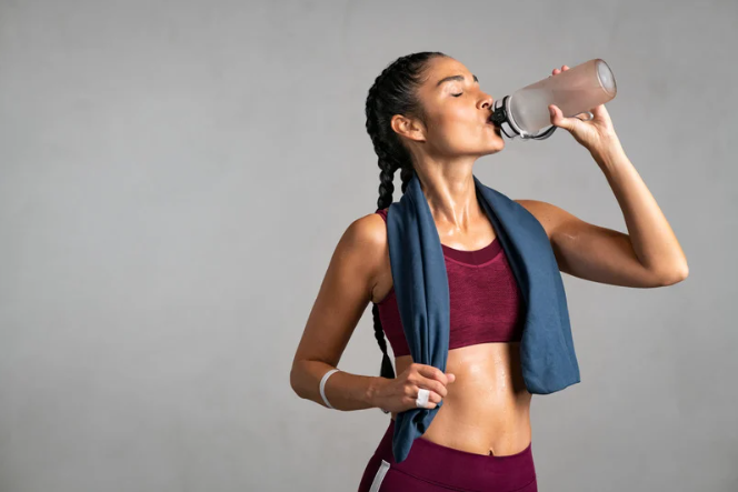 Woman Drinking Water Wearing Branded Gym Towel